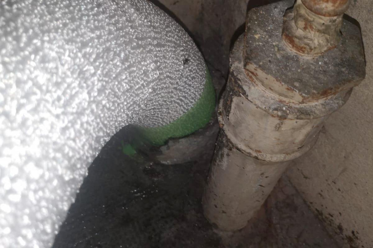 Chemisage d'une descente d'eau pluviale